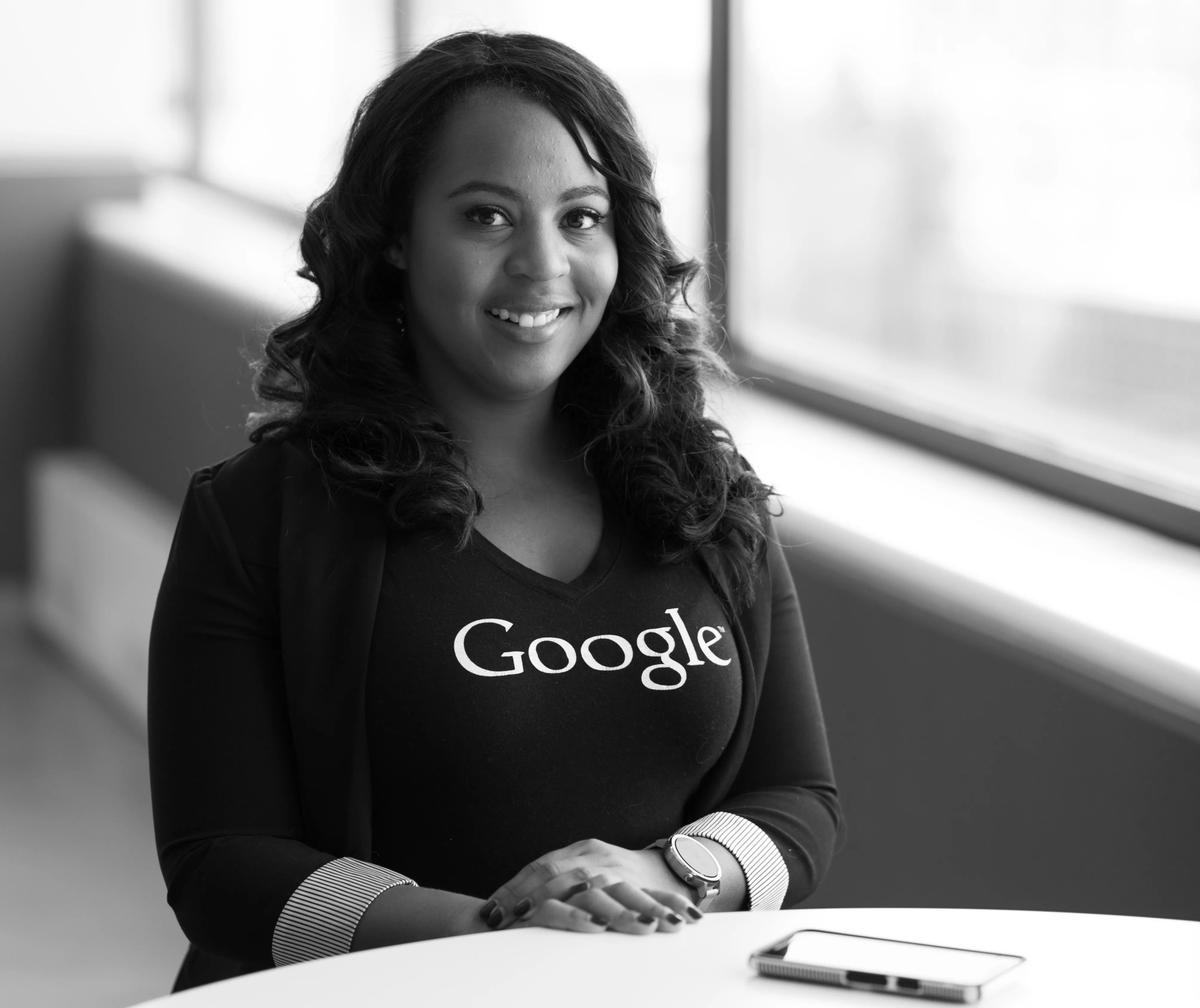 A woman in a Google shirt.