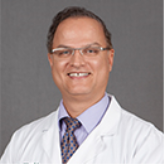 Dr.  Adrian Eshraghi 